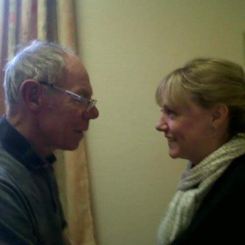 Helen and her father look into each other's eyes