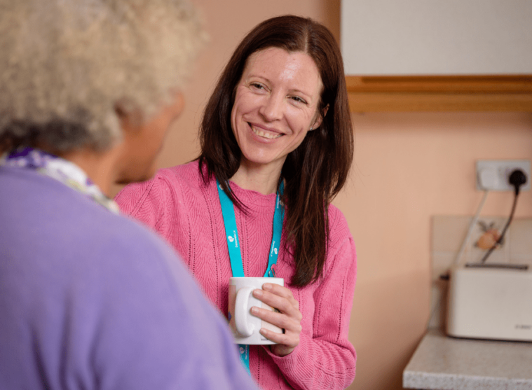 Hannah Gardener, Admiral Nurse, talking to a woman