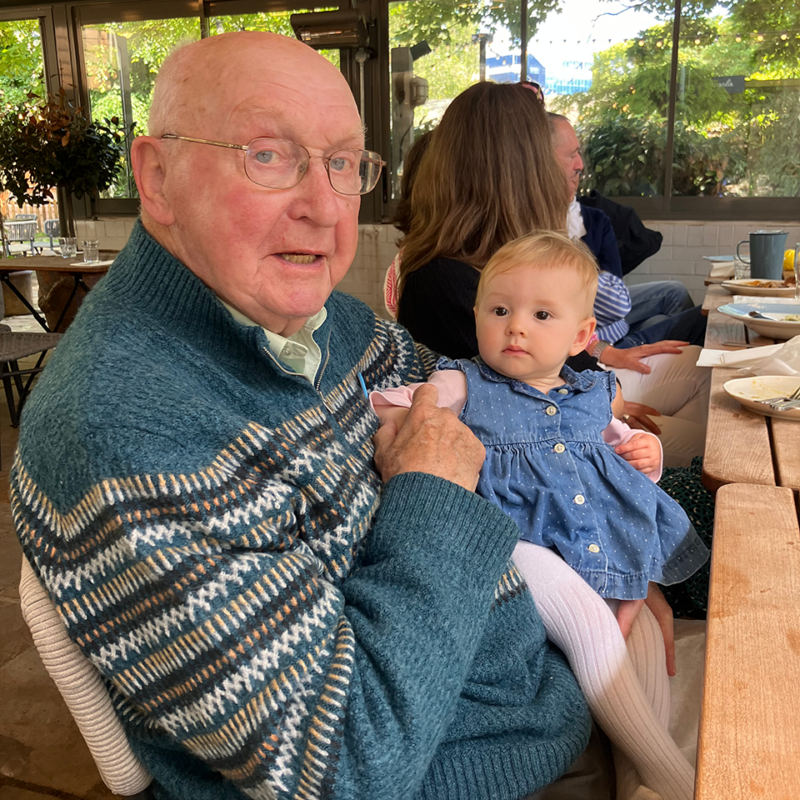 Jack holds his grandaughter