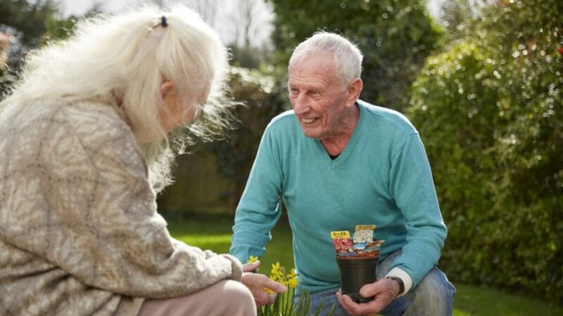 A man and woman in the garden